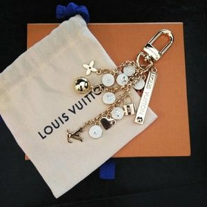 Louis vuitton bag charm key holder locks and heart